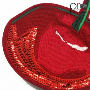 körsbär broderi paljett