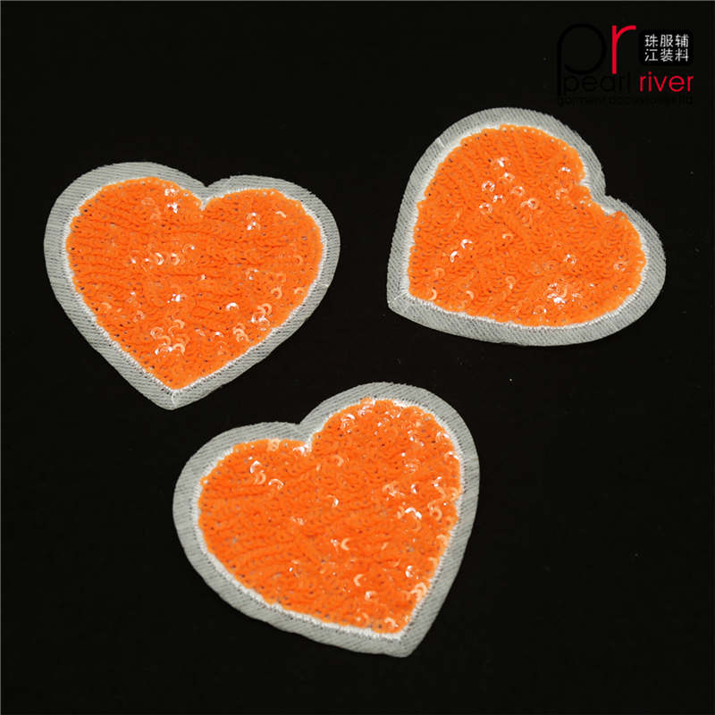 Orange hjärtaform paljett