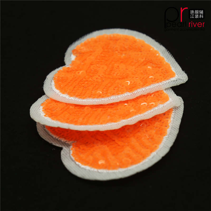 Orange hjärtaform paljett