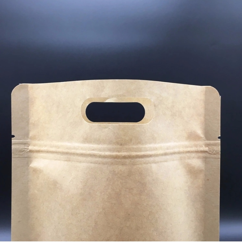 Kraftpapper Stand Up Pouch with Zipslock and die cut hantel for mutts & jujube and other torr frukts