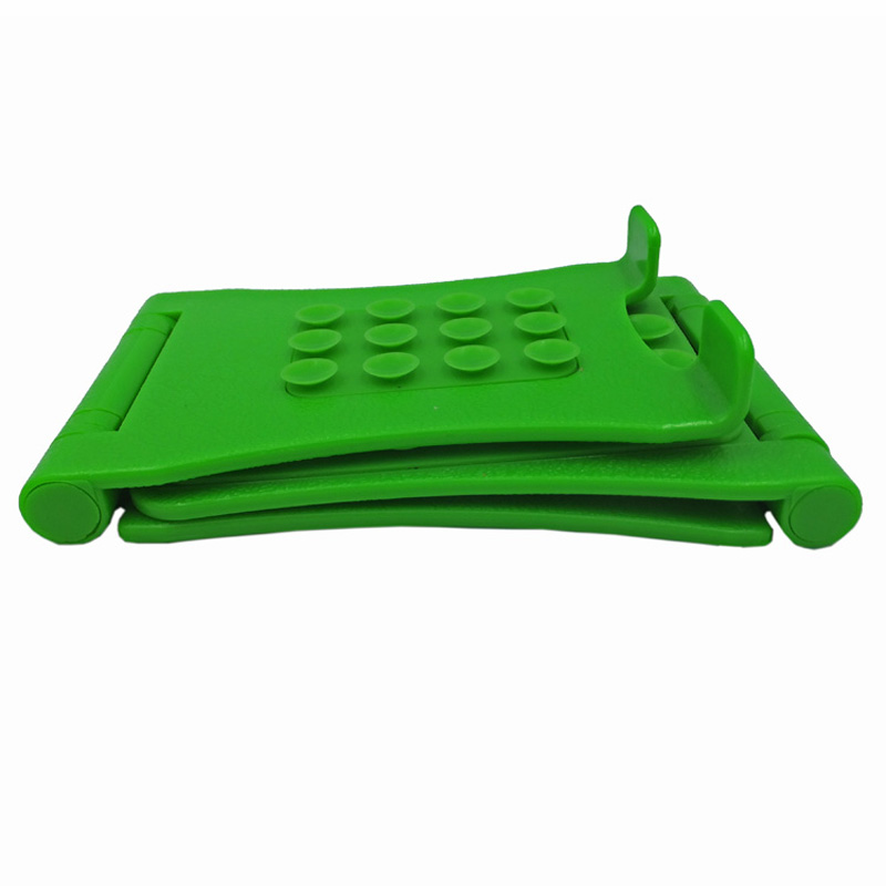 Grön justerbar hopfällbar silikon telefonhållare