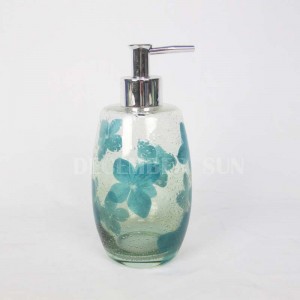 Klart glas med dekalerat badrumstillbehör