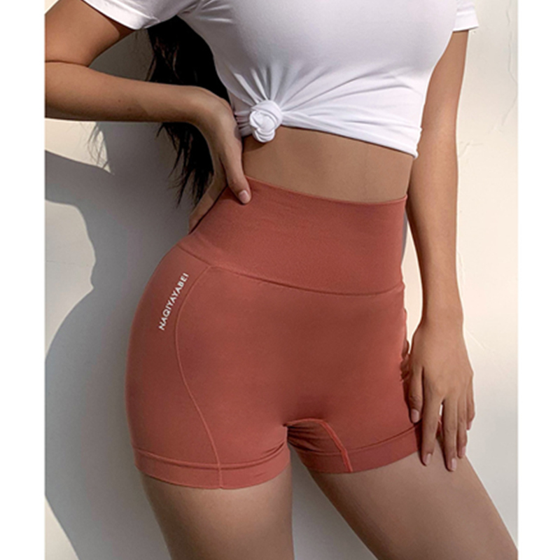Damtröja med hög midja och trånga benkläder med shorts