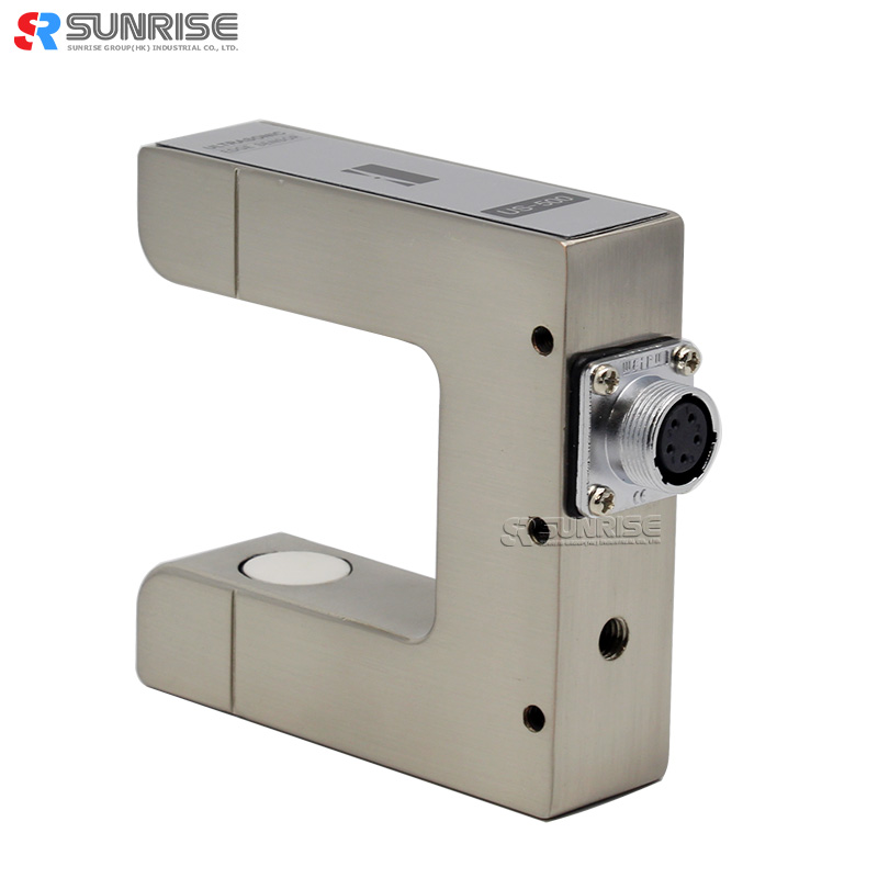 Ultrasonisk sensor US-500 för skrivande maskin använder webbguide