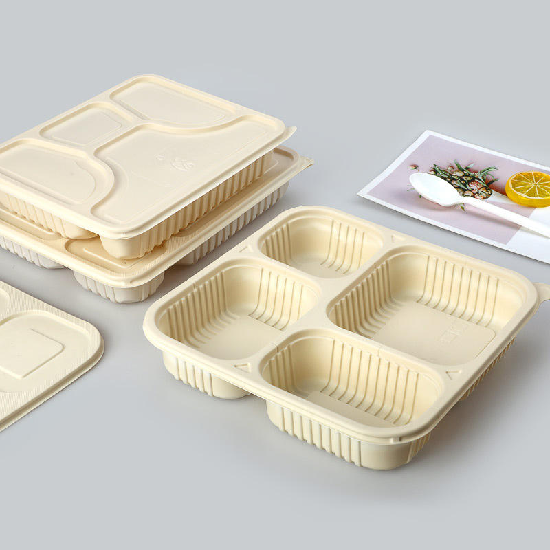 Fyra fack design Biologiskt nedbrytbar majsstärkelse Matbehållare Mikrovågsugn Uppvärmning Take Away Matförpackning Lunchlåda