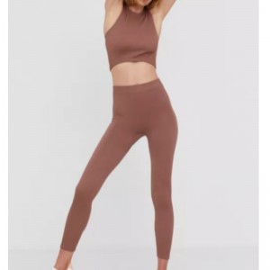 Ärmlös elastisk stickning jersey sport kostym