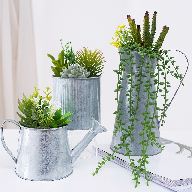 Fabriks direktförsörjning Konstgjord succulent i järnkruka
