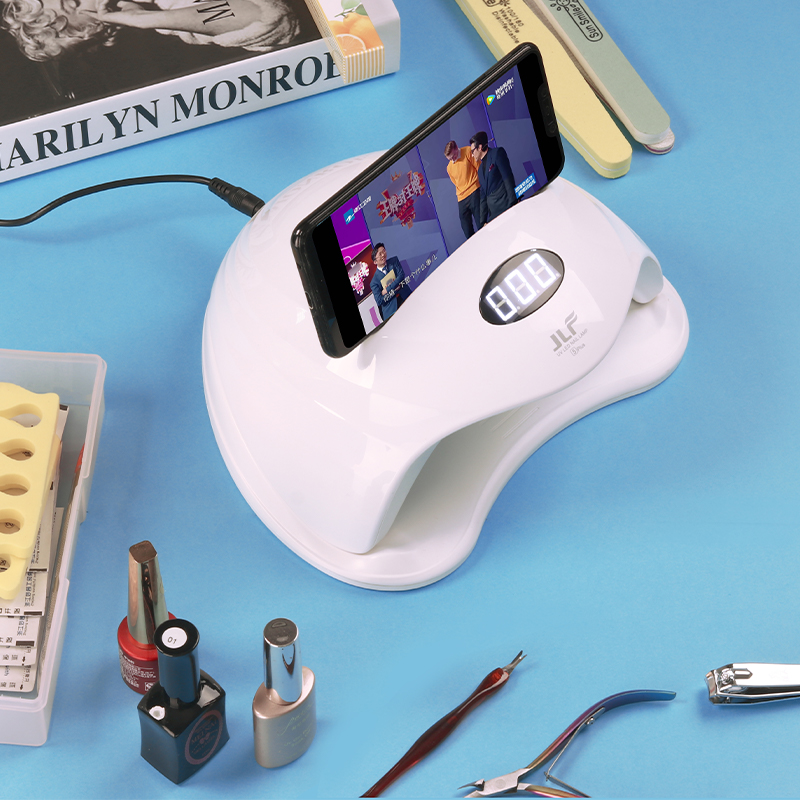 Nagelkonstfototerapimaskin med mobiltelefonhållare JLF5PLUS
