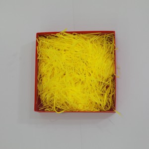 Gul fyllningsrynka strimlad papper