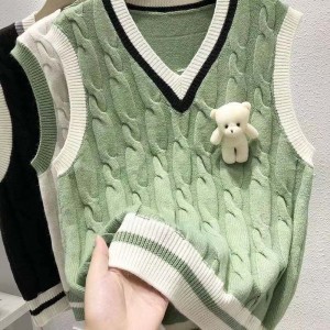 Stickade västkvinnor och hösttröja och hösttröja