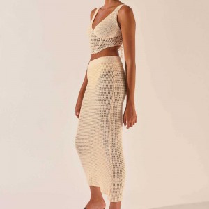 2023 Nya kvinnors klädvirka ihålig stickning V-ringad ärmlös Vest Crop Top Sexig höftkjol 2-bitar Dräktklänningströja