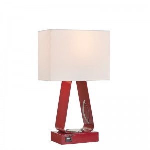 Tiny Desk Lamp med röd finish, en USB -laddningsport, en trådlös laddstation och en på/off -rockerbrytare vid gästrummet