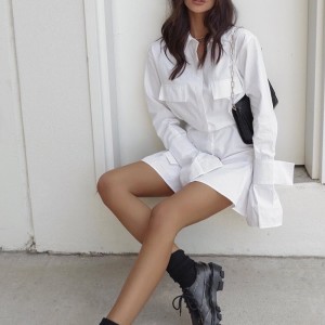 Fransk vit klänning med midja och manschetter och långa flikar för kvinnor 2023 Ny design midja och solid färg långärmad kjol