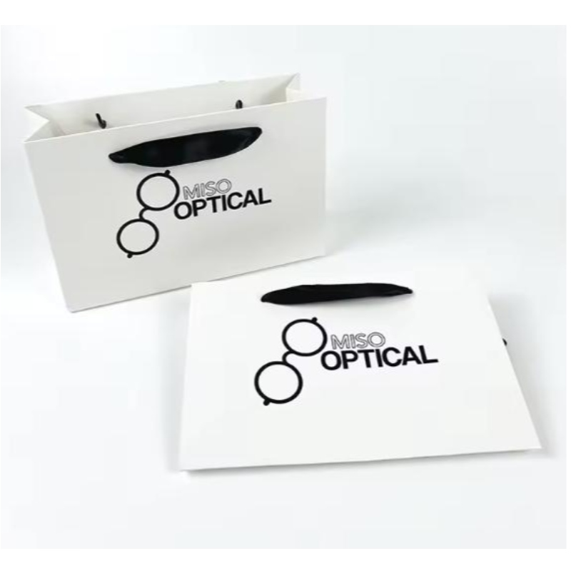 Tryckta papperspåsar kartong lyxig vit kraft papper presentpåse med bandhandtag för shoppingväska med din egen logotyp